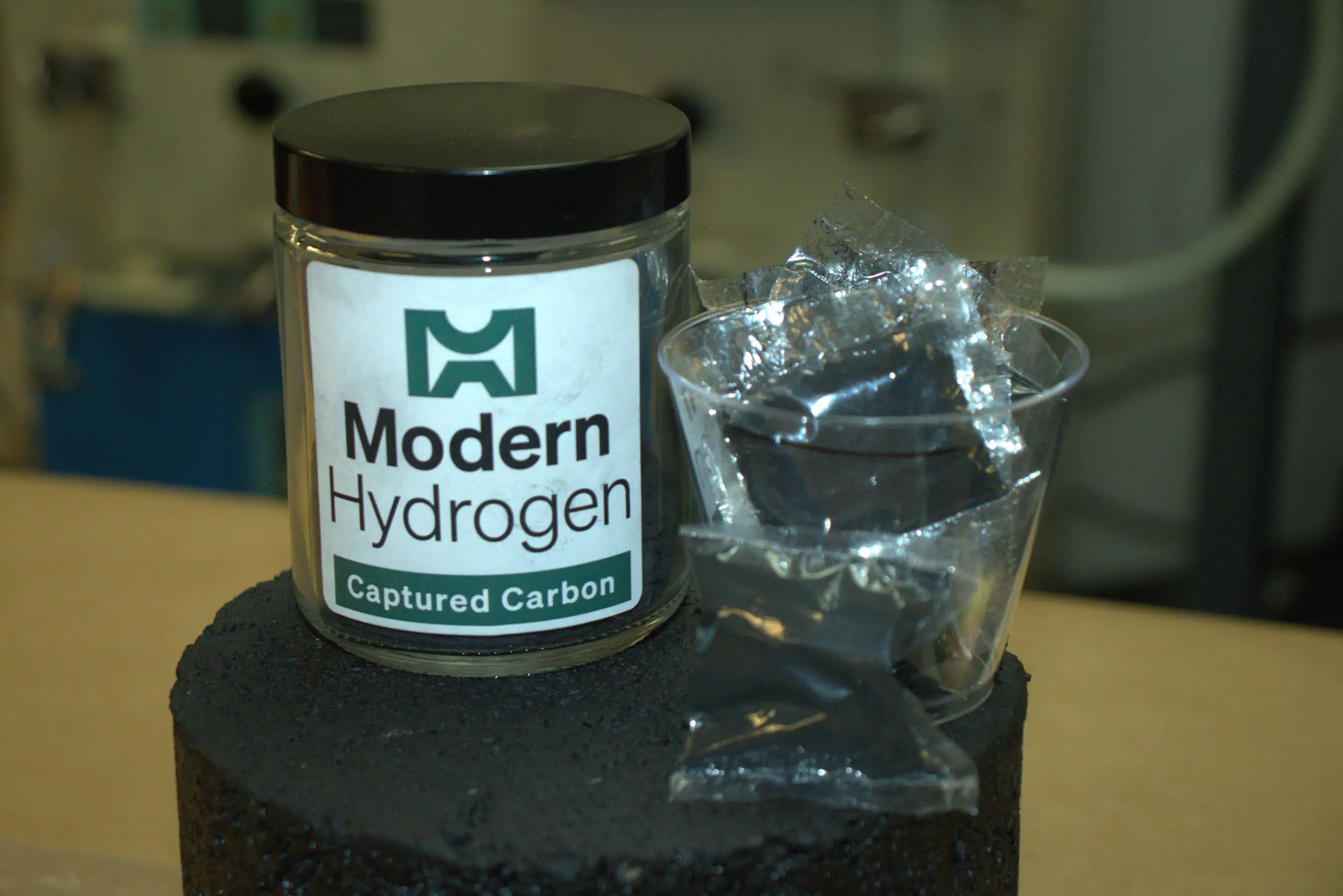 cannister of modern hydrogen carbon black with modern hydrogen label and logo on front