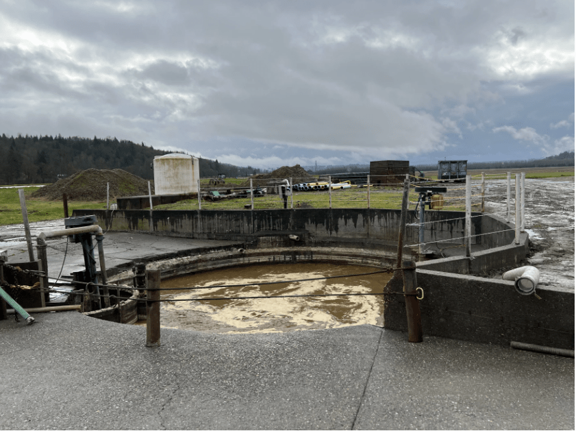 About 85,000 gallons a day of cow manure and food waste flow into the pit at Werkhoeven Dairy in Monroe, Washington. The digester captures methane that powers a generator, producing enough renewable energy for nearly 700 homes. This is an example of one of the uses of hydrogen that can come from RNG.
