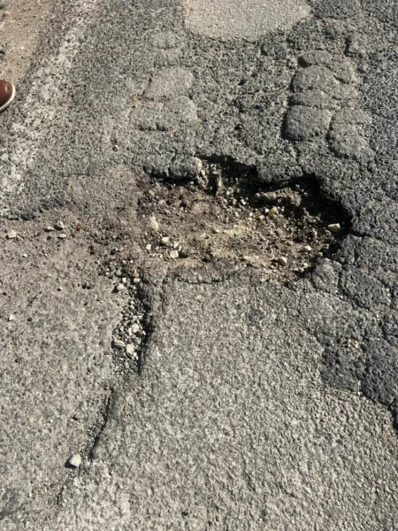 workability of cold-patch is absolutely key. This pothole needs to be filled with sustainable material that is also workable. 